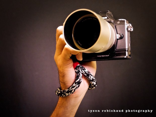 omd em5 with black garda wrist strap